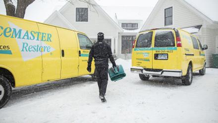 servicemaster restore trucks in the snow 