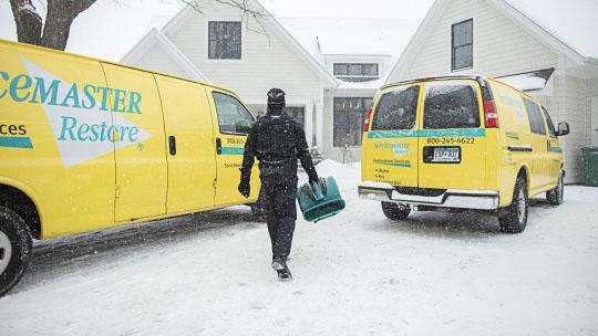 servicemaster restore trucks in the snow 