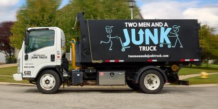 TWO MEN AND A JUNK TRUCK in motion
