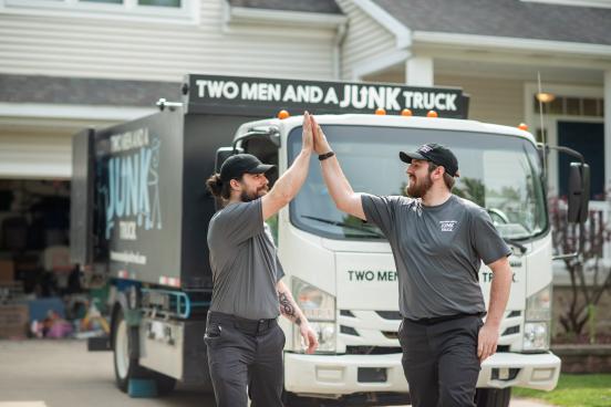 Junk Haulers High Fiving